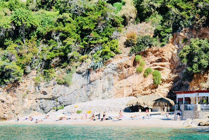 50-minute Panoramic Cruise of Dubrovnik with English Audio Guide - St. Jacob’s Beach: the base-of-a-cliff view you can’t replicate as easily on foot