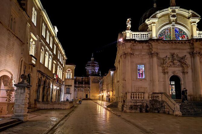 Dubrovnik By Night Walking Tour - Luza Square: Sponza, the bell tower, and the church in the middle