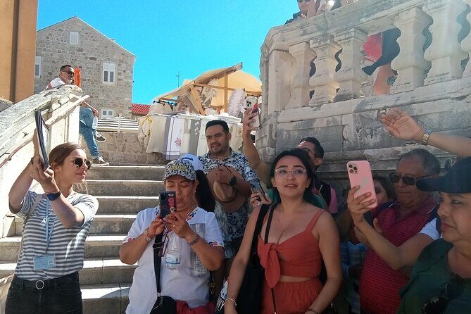 Dubrovnik City Tour: Panorama Drive & Sightseeing Walk - Buža Gate drive-by: the city wall from the outside