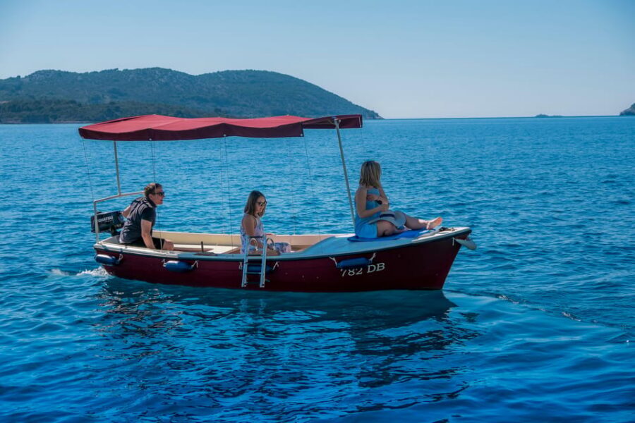 Dubrovnik: Elaphiti Islands Boat Rental - Sunj Blue Lagoon: beach time with shade, sand, and downtime