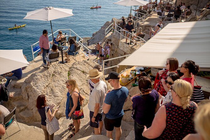 Dubrovnik Food and Drink Walking Tour with a Local Guide - What’s actually on the menu: barley with shrimps, Pag cheese, kopun salad, carob cake