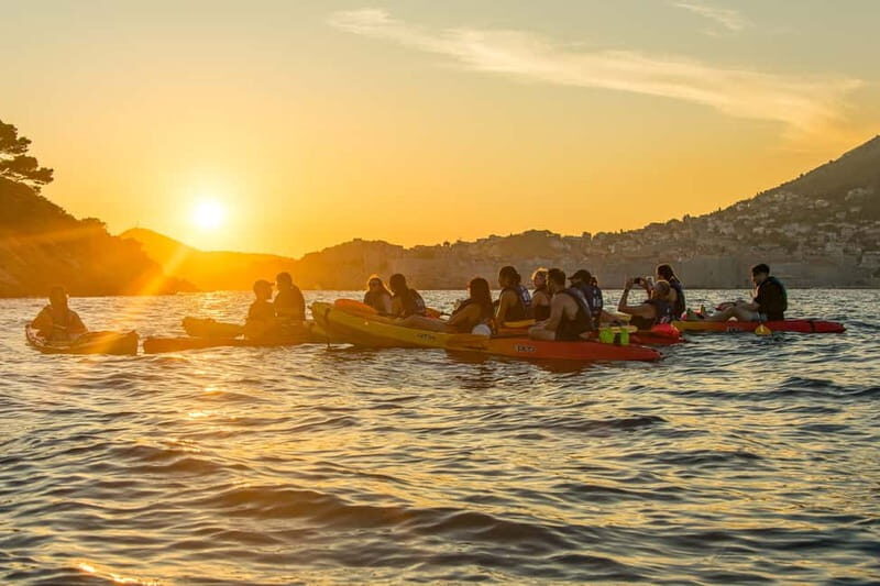 Dubrovnik: Guided Sunset Sea Kayaking with Snacks and Wine - Walls of Dubrovnik from sea level: the sightseeing that hits different