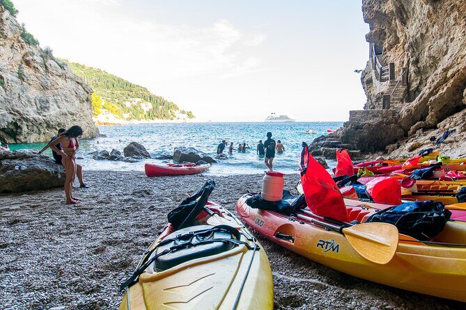 Dubrovnik Sea Kayaking Sunset Paddle - Betina Cave Beach: Snorkeling Reefs, Sunbathing Views, and Cliff-Jumping