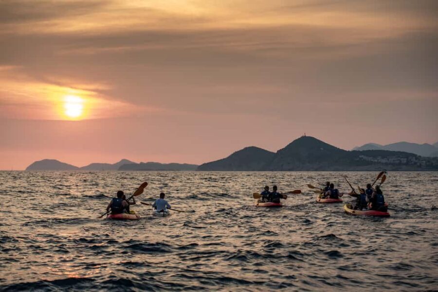 Dubrovnik: Sunset Kayaking and Snorkeling Tour - Paddling past the walls: the best part feels like a moving viewpoint