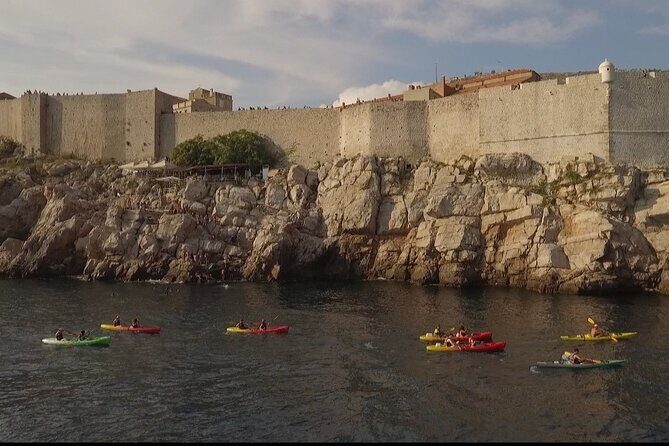 Dubrovnik: Sunset Kayaking & Snorkeling with water &wine - Betina Cave Snorkeling Break: Masks, Cold Water, and Slippery Spots