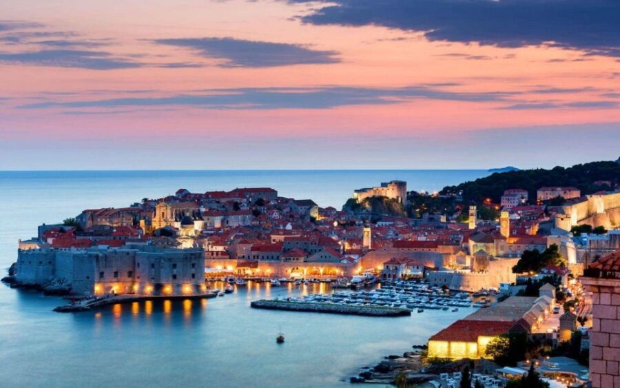 From Dubrovnik: Golden Hour Sunset Cruise with Free Drinks - One hour of panoramic sailing: Old Town walls and Lokrum Island views